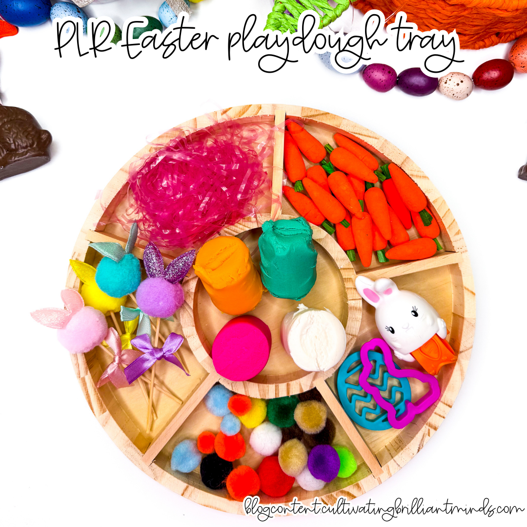 an easter playdough tray with mini carrots, pom poms, and easter grass