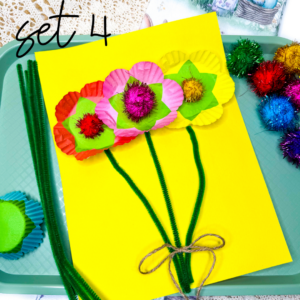 cupcake liners with a pom pom in the middle to look like a flower